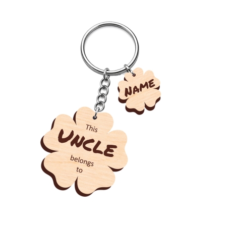 Personalised modern wooden flower keyring with bold typography and minimalist engraved floral design