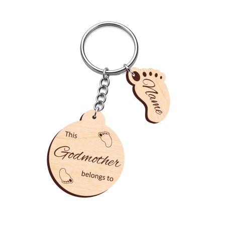 Personalised round wooden keyring for a Godmother with a unique baby foot-shaped name charm.