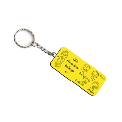 Custom laminate family portrait keyring for Grandma with four children icons in gold brushed black
