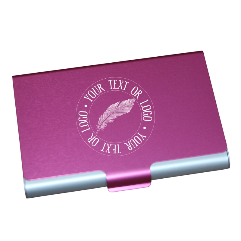 Personalised fuchsia pink aluminium business card holder with sharp silver engraving.