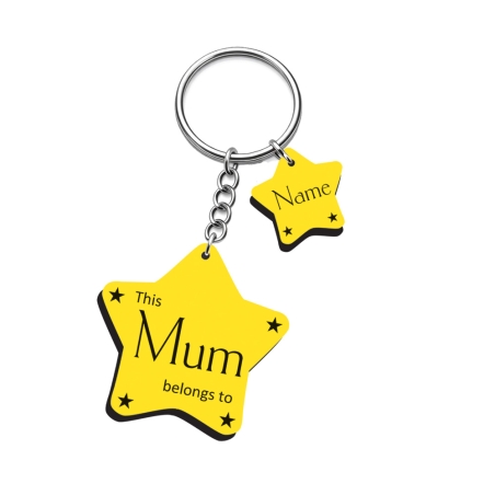 Decorative edition star keyring with elegant serif font and tiny stars engraved in the corners of the yellow laminate charms.