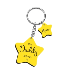 Stylish star keyring combining two types of fonts: a clean modern block text and an elegant flowing script for the name Daddy.