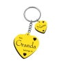Decorative heart keyring with engraved stars and elegant serif font - personalised family gift