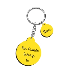 Personalised yellow round keyring with script font for Granda and name charms