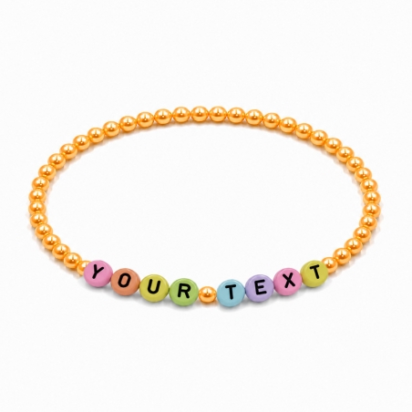 Orange Pearl personalised 4mm beaded bracelet with custom name lettering and a soft pearlescent orange finish