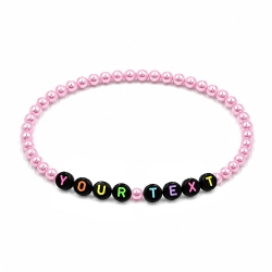 Candy Pink Pearl personalised 4mm beaded bracelet with custom name lettering and a soft pearlescent pink finish