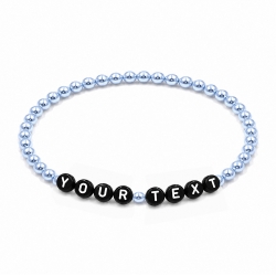 Ice Blue Pearl personalised 4mm beaded bracelet with custom name lettering and a delicate icy-blue pearlescent finish