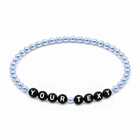 Ice Blue Pearl personalised 4mm beaded bracelet with custom name lettering and a delicate icy-blue pearlescent finish