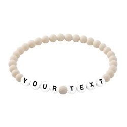 Soft Ivory Matte personalised 6mm acrylic bead bracelet with custom name lettering, handmade elastic jewellery