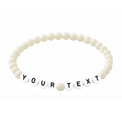 Cream personalised 6mm acrylic bead bracelet with glossy cream beads and custom lettering