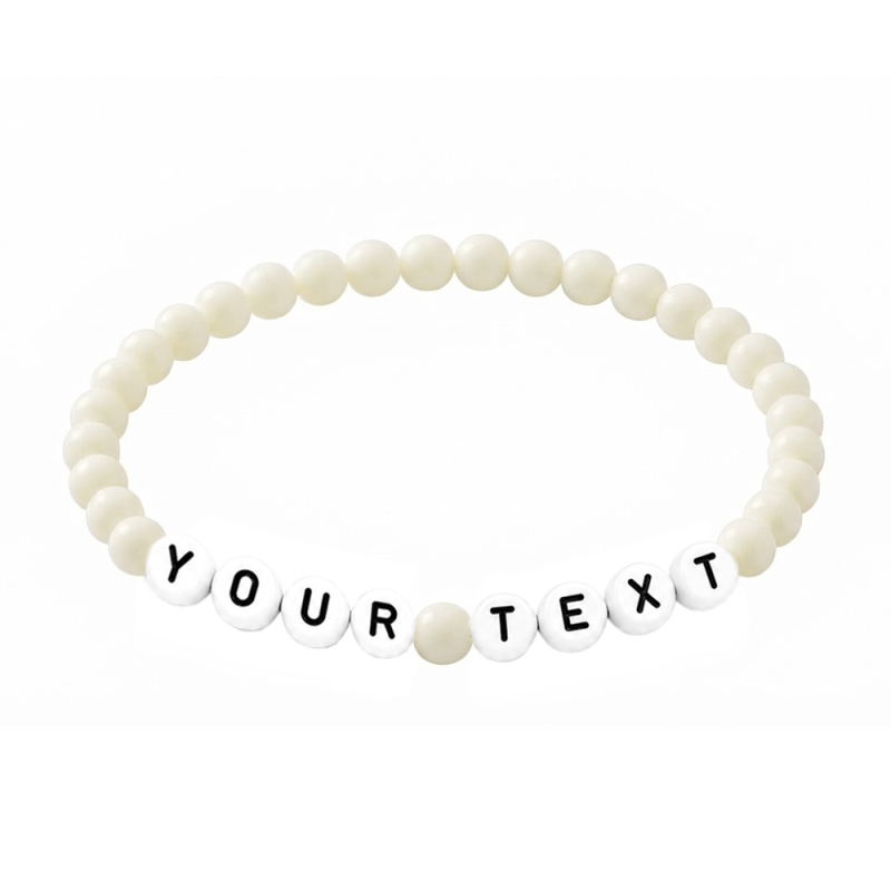 Cream personalised 6mm acrylic bead bracelet with glossy cream beads and custom lettering