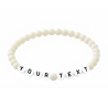 Cream personalised 6mm acrylic bead bracelet with glossy cream beads and custom lettering